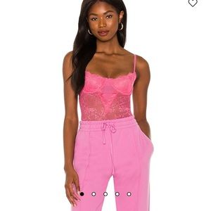 pink body suit from revolve